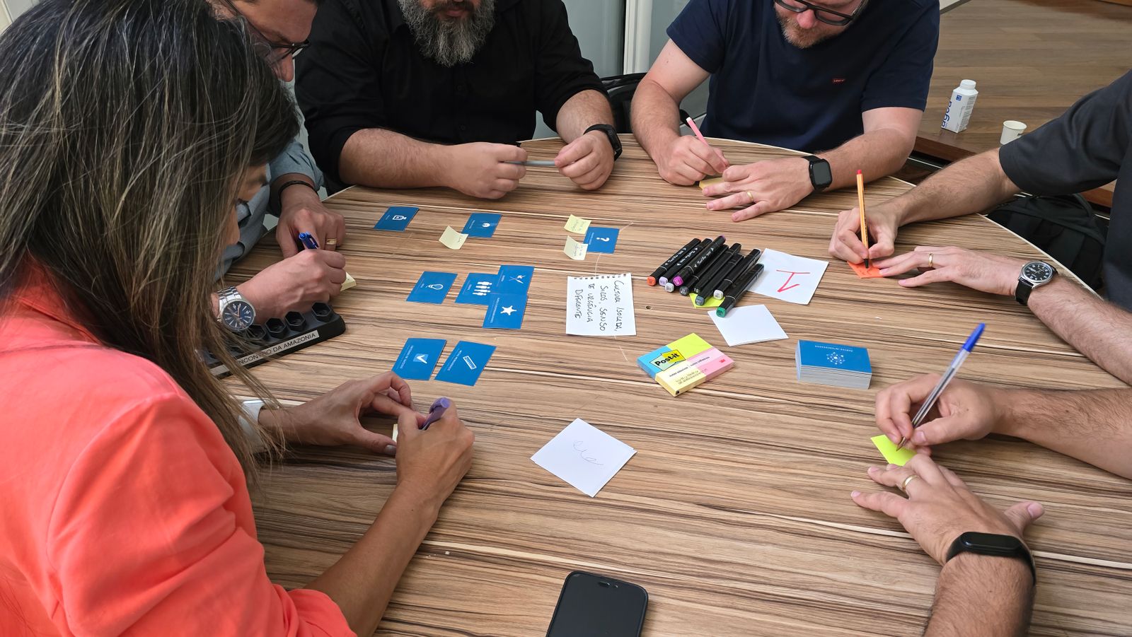 Workshop participants collaborating around a table